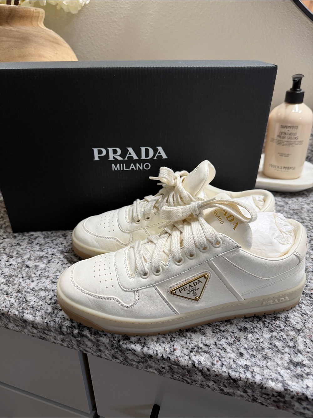 Prada Cream Leather Low-Top Sneakers with Gold Logo